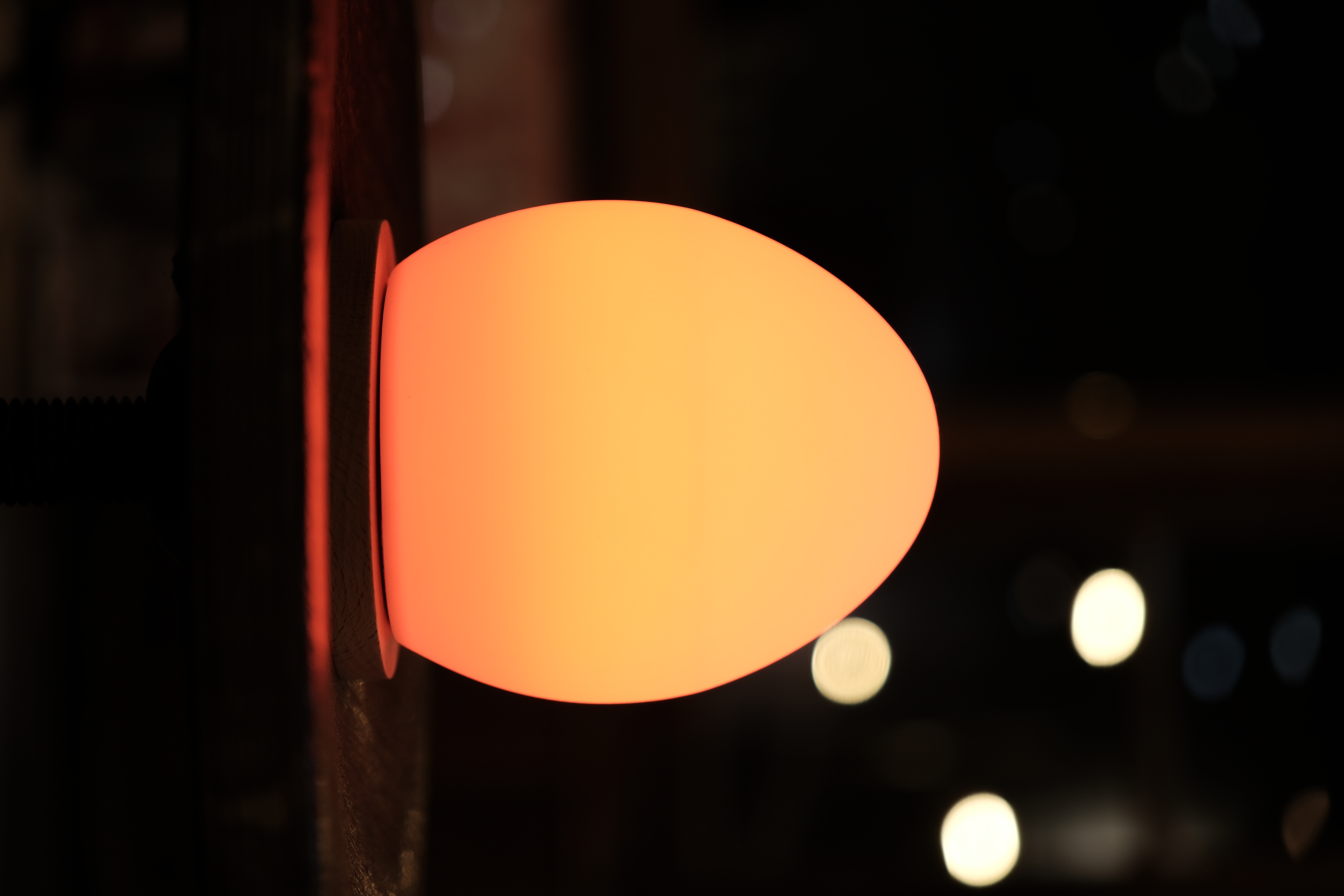 Lume glowing deep amber after dark